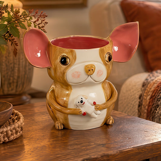 Dottie, a handmade ceramic Boston Terrier vase with pink ears, holding a small white puppy