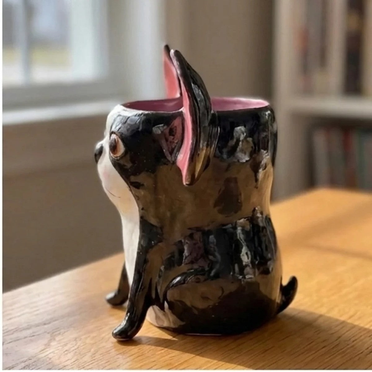 Millie the Boston Terrier ceramic vase, side profile view showing pink glazed ears